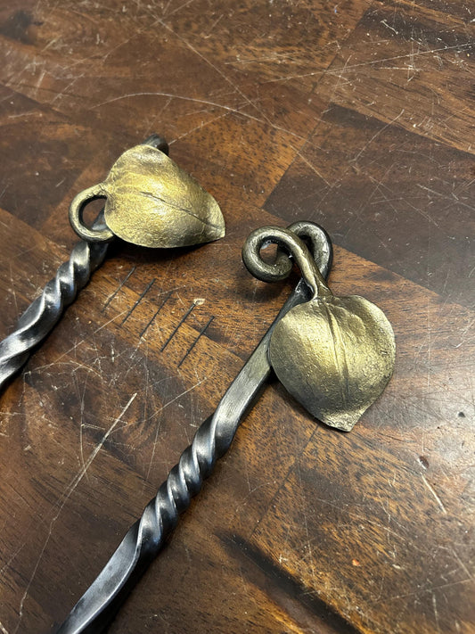 Hand forged meat turner. 3/8” carbon steel. Light yet strong with a forge finish and leaf end. 16” long