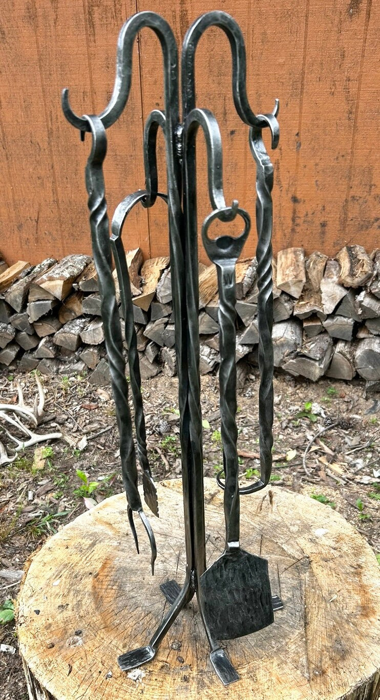 Hand forged 4 piece  bbq tool set with forged stand.