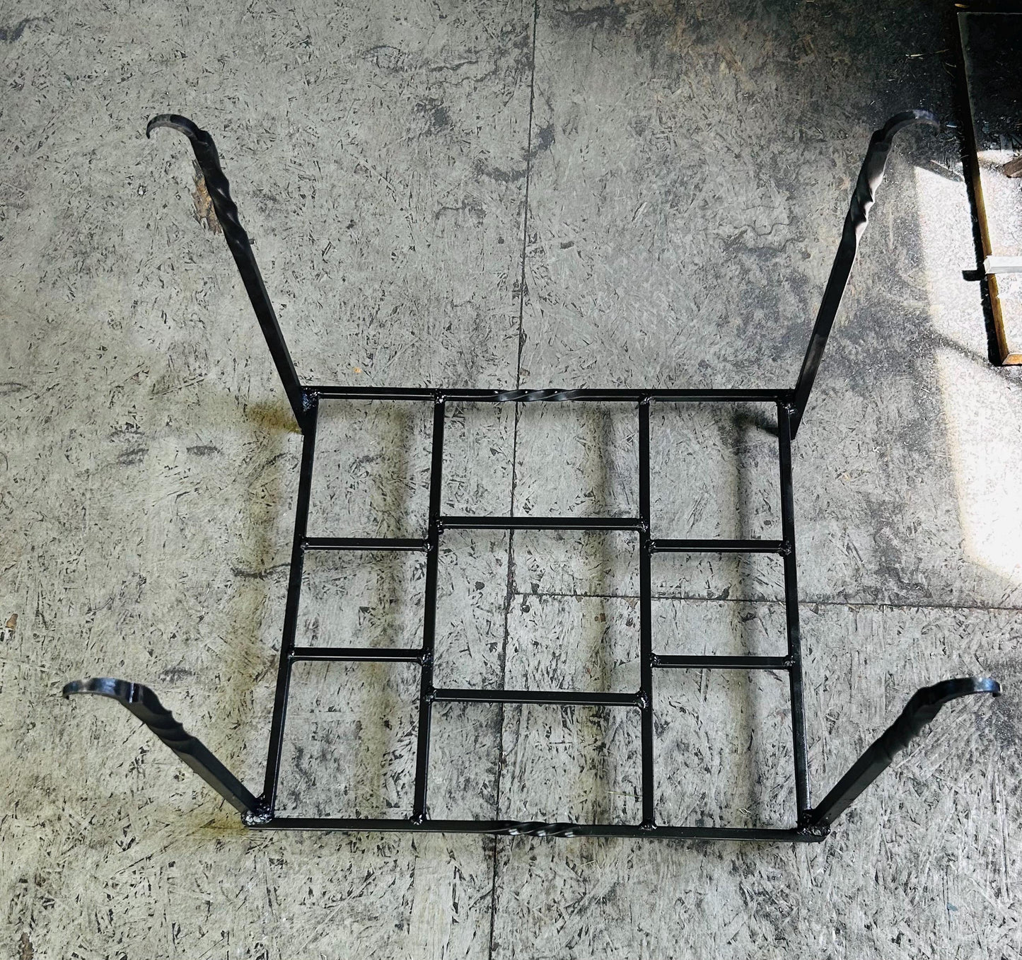 Hand forged and Welded log rack