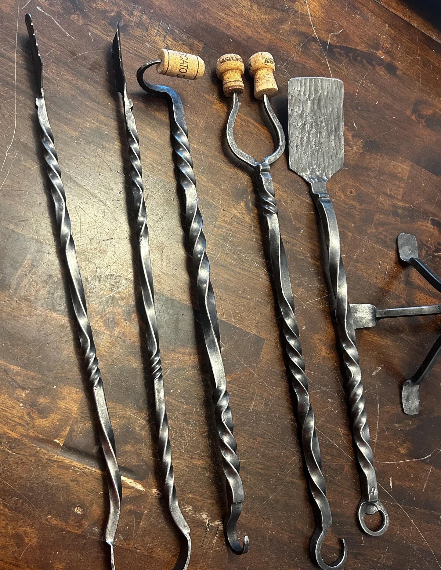 Hand forged 4 piece  bbq tool set with forged stand.